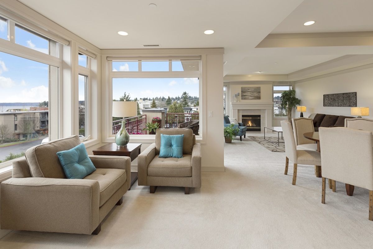 Bright apartment living room with city-facing windows